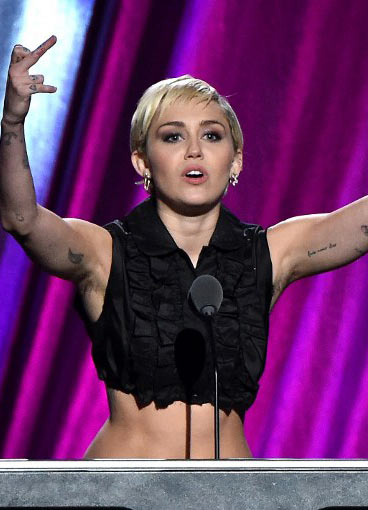 Miley Cyrus Rocks Pasties and Armpit Hair
